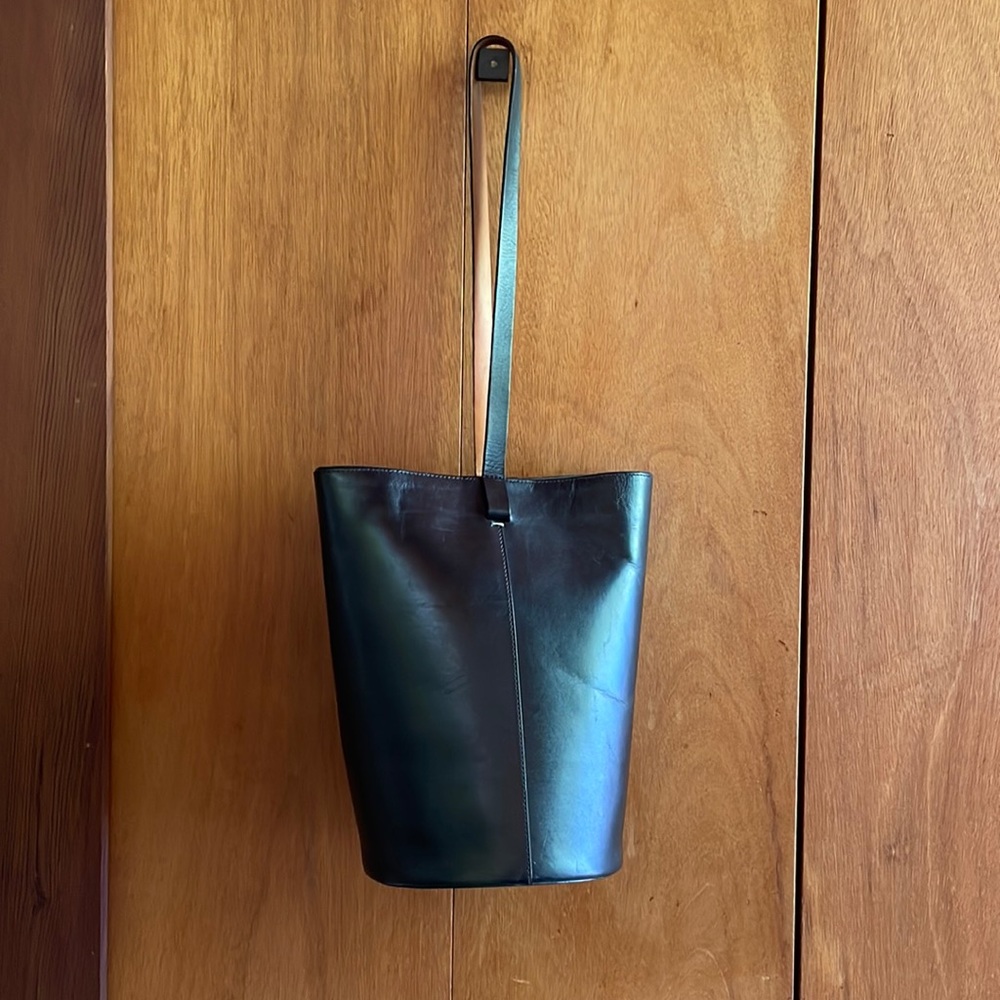 Building Block - black leather bag with tan leather on back of strap